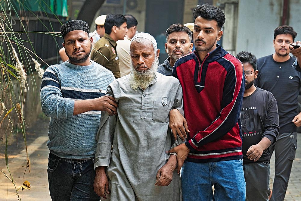 | Photo: Suresh K. Pandey : Shock and Disbelief: Relatives of Noman, one of the victims, at the Lok Nayak Jaya Prakash Hospital