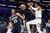| Photo: AP/Gerald Herbert : Denver Nuggets guard Peyton Watson (8) loses the ball against New Orleans Pelicans forward Trey Murphy III (25) in the second half of an NBA basketball game in New Orleans. 