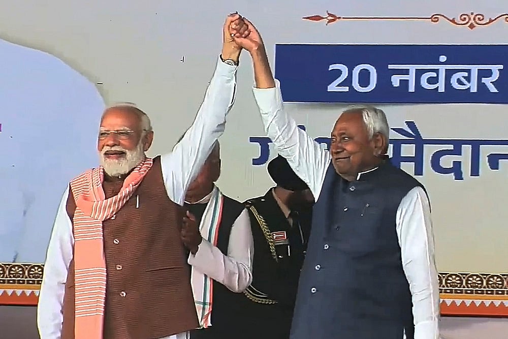 | Photo: @Jduonline via PTI  : Prime Minister Narendra Modi with newly sworn-in Bihar Chief Minister Nitish Kumar during the swearing-in ceremony, at Gandhi Maidan in Patna.