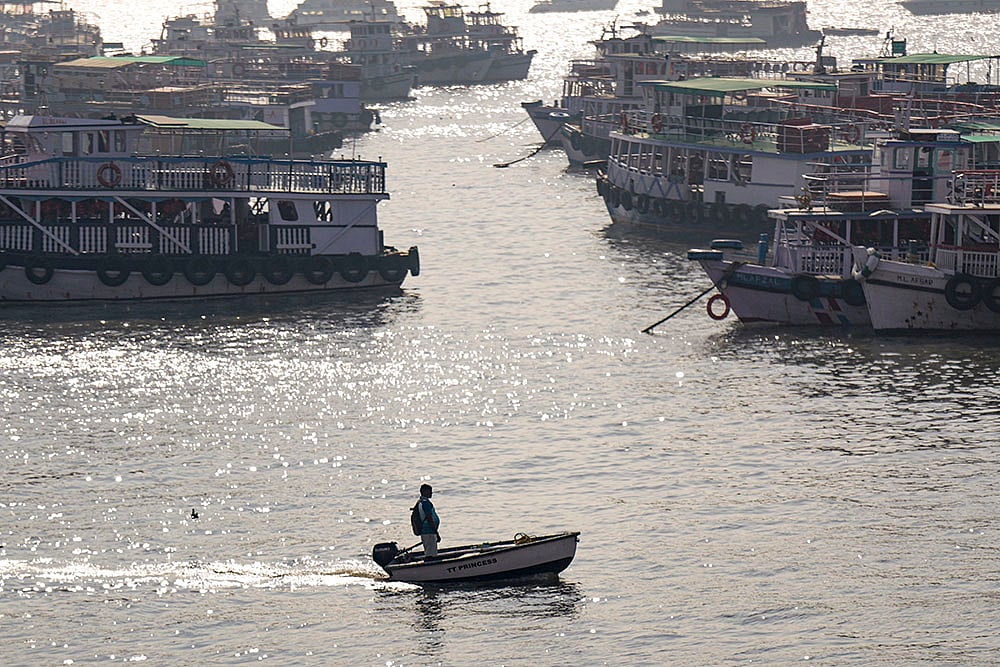 Boats anchored near Gateway of India