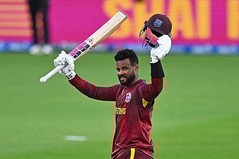 West Indies' Shai Hope celebrates making 100 runs against New Zealand during their One Day International cricket match in Napier, New Zealand.