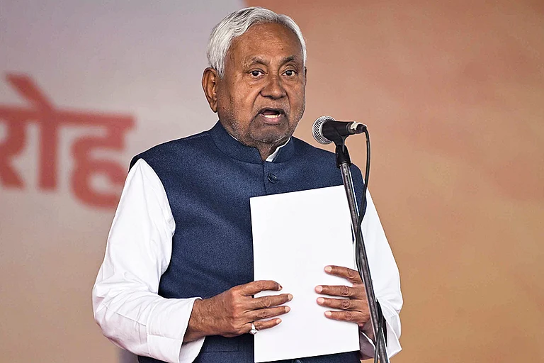 JD(U) supremo Nitish Kumar takes oath as the Chief Minister of Bihar during the swearing-in ceremony, at Gandhi Maidan in Patna. Nitish took the oath as CM for a record 10th time. - | Photo: PTI