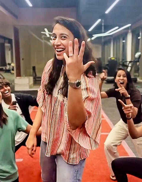 World Cup-winning Indian women's cricket team star Smriti Mandhana shows her ring as she confirms her engagement with music composer Palash Mucchal. 