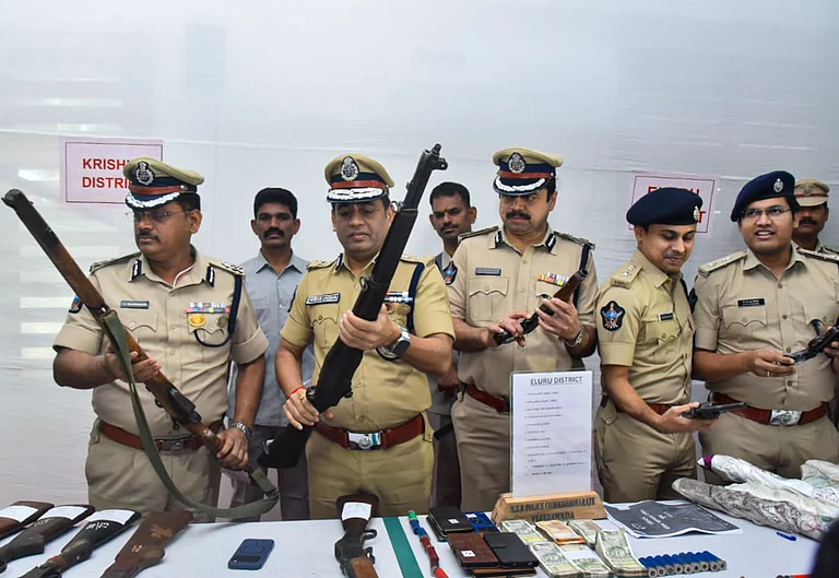 ADGP (Intelligence) Mahesh Chandra Laddha with other officials shows recovered arms and ammunitions during a press conference, in Vijayawada - PTI