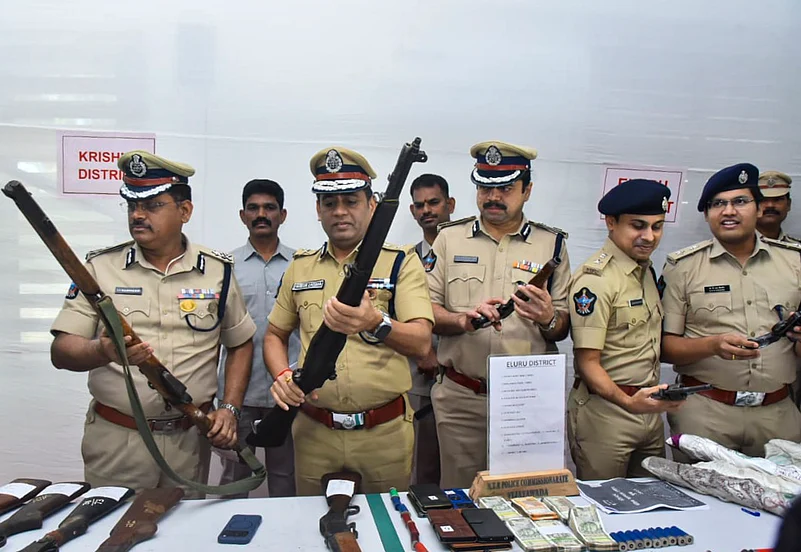 Police show arms and ammunition recovered from Maoists.jpg