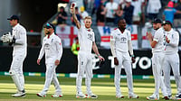 AP : England's captain Ben Stokes, centre, acknowledges the crowd after taking five wickets during the first Ashes Test between Australia and England in Perth.