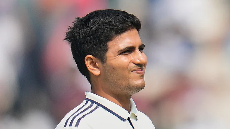 India's captain Shubman Gill reacts as he leaves the field after retired hurt on the second day of the first cricket test match between India and South Africa in Kolkata, India, Saturday, Nov. 15, 2025. - (AP Photo/Aijaz Rahi)