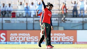 | Photo: X/ACCMedia1 : Bangladesh A's Rakibul Hasan celebrates a wicket against India A during the first semi-final of ACC Asia Cup Rising Stars 2025 on November 21, 2025.