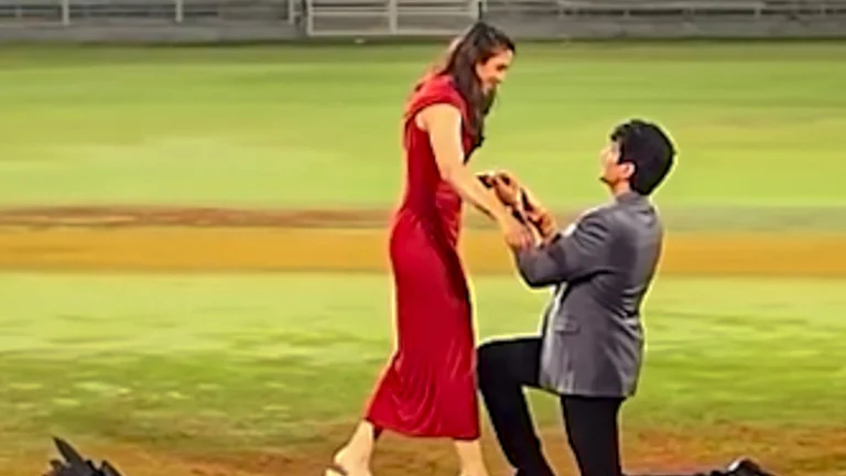 Music composer Palash Muchhal proposes to World Cup-winning Indian women's cricket team star Smriti Mandhana at the DY Patil Stadium, in Navi Mumbai. - @palash_muchhal/Instagram via PTI Photo