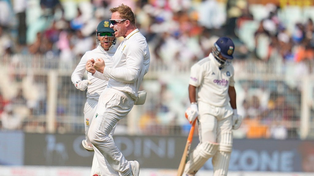 South Africa's Simon Harmer, centre, celebrates the dismissal of India's Rishabh Pant, right, on the third day of the first Test in Kolkata. - AP