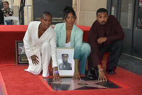 Letitia Wright, from left, Taylor Simone-Boseman and Michael B. Jordan pose during a posthumous Hollywood Walk of Fame ceremony for actor Chadwick Boseman on the Hollywood Walk of Fame on Thursday, Nov. 20, 2025, in Los Angeles.
