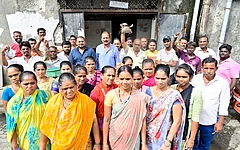 Sassoon Dock community which would be affected after godown will shut by authorities at Sassoon Dock, at Colaba on July 4, 2025 in Mumbai, India. The dispute, which is over a decade old, began after Mumbai Port Trust (MbPT) issued eviction notices alleging Maharashtra Fisheries Development Corporation (MFDC) had failed to pay lease rent. MFDC had leased the land from MbPT and sublet it to local fishermen and fish traders. The Koli community and workers involved in fish packing, export, and related trades are once again facing uncertainty and potential displacement. (Photo by Anshuman Poyrekar Hindustan Times) Koli Fisherman Community Facing Eviction From Sassoon Dock Over MFDC-MbPT Struggle