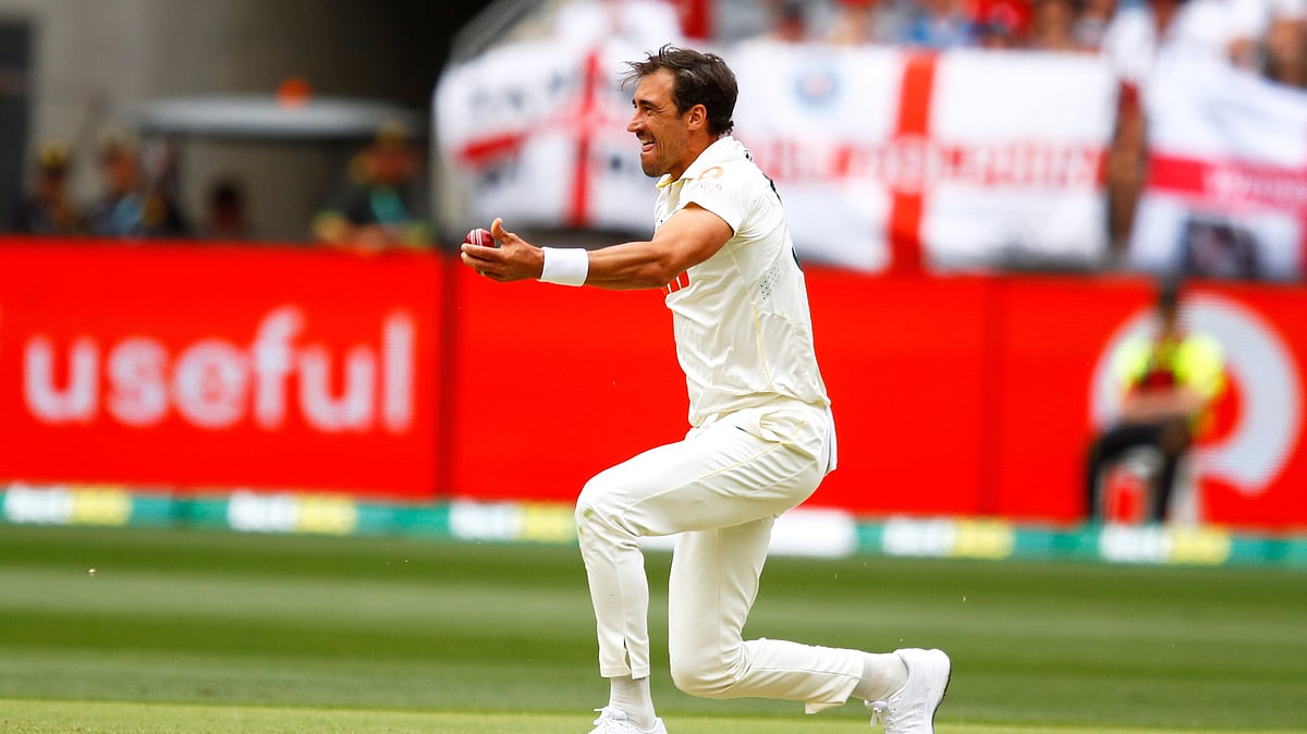 Australia's Mitchell Starc celebrates the wicket of England's Zak Crawley on day two of the first Ashes cricket test match between Australia and England in Perth, Saturday, Nov. 22, 2025. - (AP Photo/Gary Day)