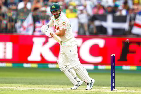 Australia's Travis Head bats on day two of the first Ashes cricket test match between Australia and England in Perth.