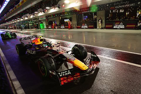Red Bull driver Yuki Tsunoda of Japan leaves the pits during a qualifying session at the Formula One Las Vegas Grand Prix Auto Race in Las Vegas. 