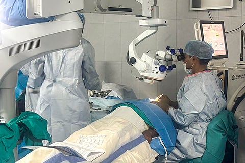 Doctors conduct eye tests during the Advanced Surgical Eye Camp, a nationwide humanitarian initiative launched by the Indian Army, in New Delhi. 