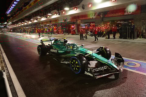 Aston Martin driver Fernando Alonso of Spain leaves the pits during a qualifying session at the Formula One Las Vegas Grand Prix Auto Race, in Las Vegas.  