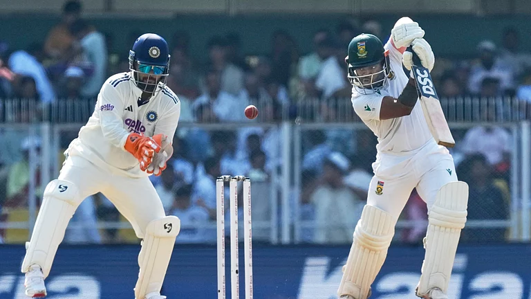 South Africa's captain Temba Bavuma plays a shot on the first day of the second cricket test match between India and South Africa in Guwahati, India, Saturday, Nov. 22, 2025. - (AP Photo/Anupam Nath)