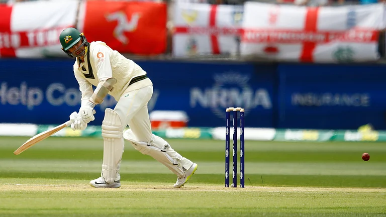 Australia Vs England LIVE Score, 1st Ashes Test, Day 2: Australia's Nathan Lyon bats on day two of the first Ashes cricket test match between Australia and England in Perth, Saturday, Nov. 22, 2025. - (AP Photo/Gary Day)