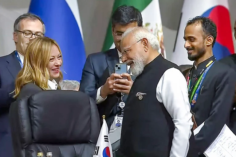 Prime Minister Narendra Modi during a meeting with his Italian counterpart Giorgia Meloni at the G20 Leaders' Summit, in Johannesburg, South Africa. - | Photo: @pmoindia/YT via PTI