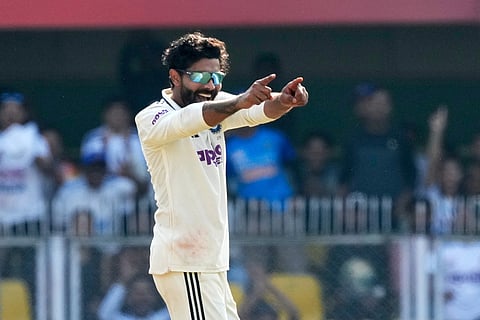 India's Ravindra Jadeja celebrates the dismissal of South Africa's captain Temba Bavuma on the first day of the second cricket test match between India and South Africa in Guwahati.