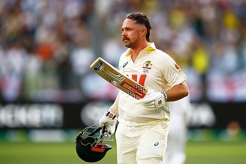 Australia's Travis Head leaves the field after losing his wicket on day two of the first Ashes cricket test match between Australia and England in Perth.