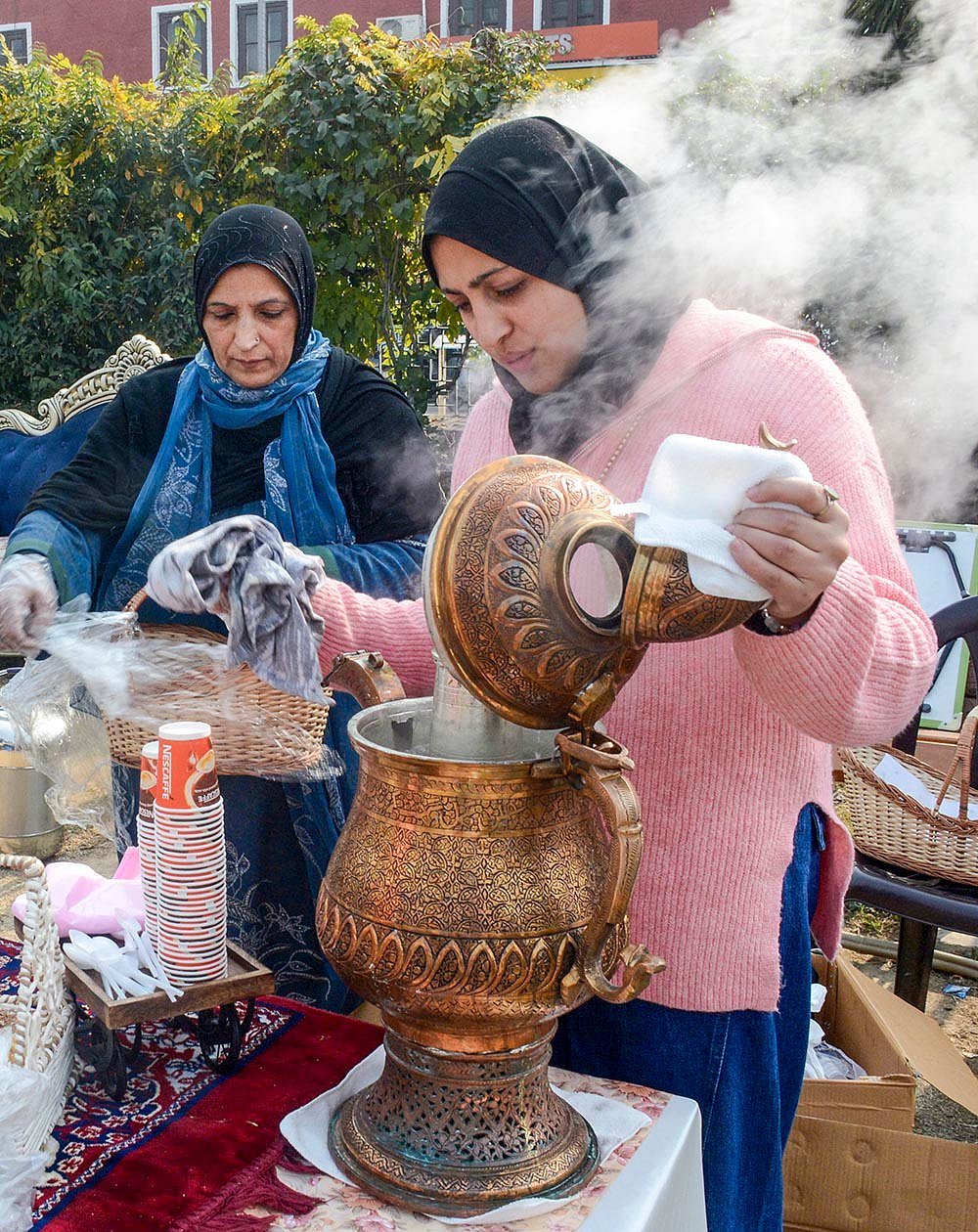 Women prepare Kashmiri Noon chai at Srinagar exhibition