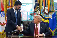 (AP Photo/Evan Vucci) : President Donald Trump shakes hands with New York City Mayor-elect Zohran Mamdani in the Oval Office of the White House, Friday, Nov. 21, 2025, in Washington. 