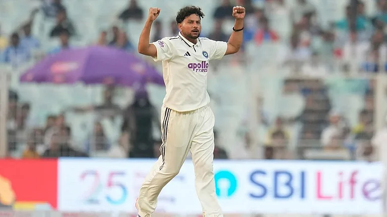 India's Kuldeep Yadav celebrates the dismissal of South Africa's Marco Jansen on the second day of the first cricket test match between India and South Africa in Kolkata. - | Photo: AP/Aijaz Rahi