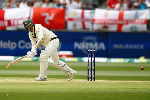 Australia's Nathan Lyon bats on day two of the first Ashes cricket test match between Australia and England in Perth.