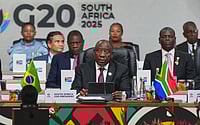 How Politics Is Affecting The G-20 Forum AP : South African President Cyril Ramaphosa addresses the opening session of the G20 leaders' summit in Johannesburg, South Africa, Saturday, Nov. 22, 2025