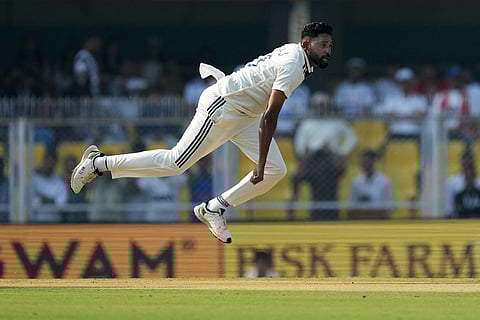 India's Mohammed Siraj bowls a delivery on the first day of the second cricket test match between India and South Africa in Guwahati.