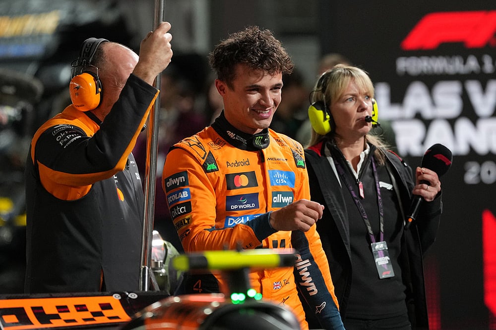 McLaren driver Lando Norris of Great Britain celebrates after a qualifying session at the Formula One Las Vegas Grand Prix auto race in Las Vegas.  - | Photo: AP/Eric Gay