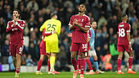 | Photo: AP/Jon Super : Liverpool players react disappointed after the English Premier League match against Manchester City on November 9, 2025. 