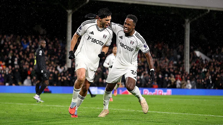 Jimenez celebrates with Sessegnon - null