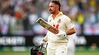 | Photo: AP/Gary Day : Australia's Travis Head leaves the field after losing his wicket on day two of the first Ashes cricket test match between Australia and England in Perth.