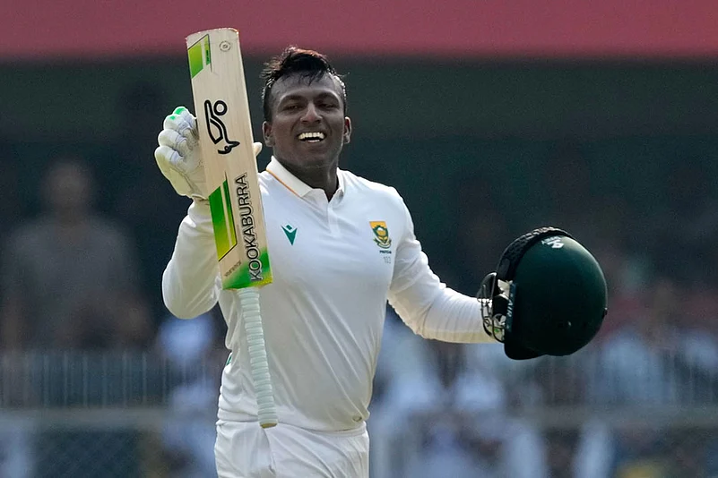 South Africas Senuran Muthusamy celebrates after scoring a century