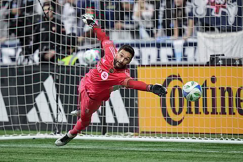 Los Angeles FC goalkeeper Hugo Lloris allows a goal to Vancouver Whitecaps' Ryan Gauld, not seen, during penalty kicks in the MLS Western Conference semifinal playoff soccer match, in Vancouver, British Columbia.