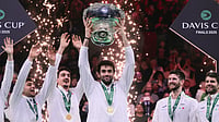 Davis Cup 2025: Matteo Berrettini and Flavio Cobolli Powers Italy To Third-Straight Title Win Opta : Italy player Matteo Berrettini lifting the Davis Cup 2025 trophy after defeating Spain in the finals.
