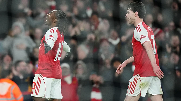 Arsenal's Eberechi Eze reacts after scoring during a Premier League soccer match between Arsenal and Tottenham in London, Sunday, Nov. 23, 2025 - (AP Photo/Frank Augstein)