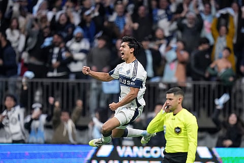 Vancouver Whitecaps' Mathias Laborda celebrates his winning goal against Los Angeles FC during penalty kicks in the MLS Western Conference semifinal playoff soccer match in Vancouver, British Columbia.