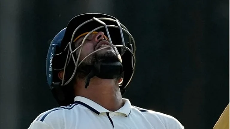 India's Kuldeep Yadav walks off the field after losing his wicket on the third day of the second cricket test match between India and South Africa in Guwahati. - | Photo: AP/Anupam Nath
