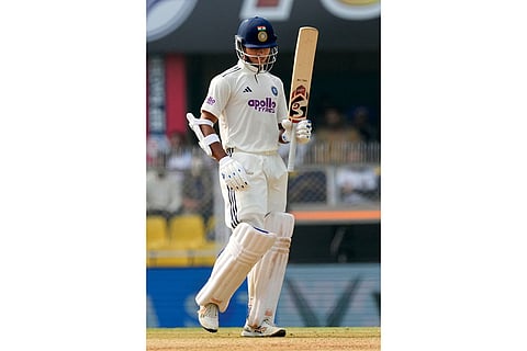 India's Yashasvi Jaiswal celebrates after scoring fifty runs on the third day of the second cricket test match between India and South Africa in Guwahati.