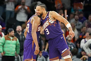 | Photo: AP/Darryl Webb : Phoenix Suns guard Jordan Goodwin, left, hugs Dillon Brooks after their win over San Antonio Spurs at the end of the second half of an NBA basketball game in Phoenix.