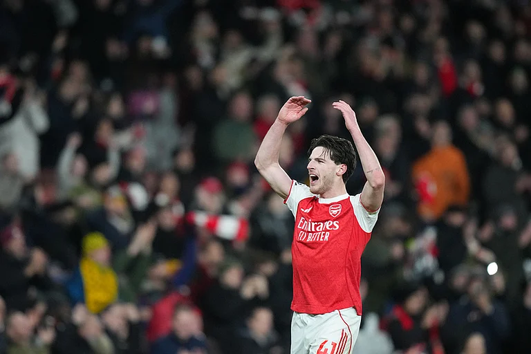 Arsenal's Declan Rice celebrates after a Premier League soccer match between Arsenal and Tottenham in London. - | Photo: AP/Frank Augstein
