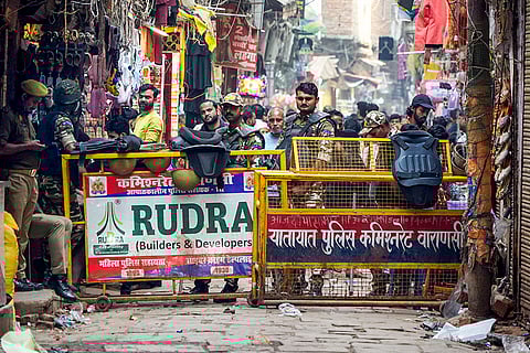 Security personnel deployed during demolition of illegal buildings at Dalmandi, in Varanasi.