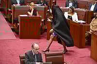Imago / AAP : The chamber erupted as she walked in, with senators objecting loudly and calling on her to remove the burqa.