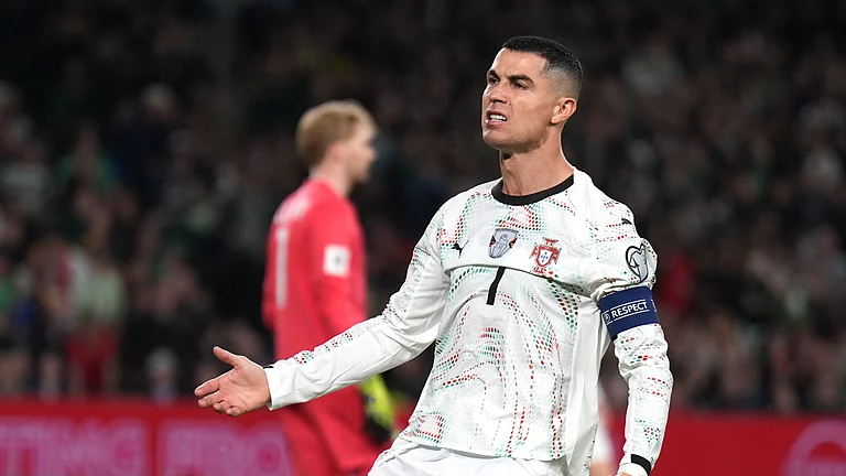 Portugal's Cristiano Ronaldo reacts during a World Cup 2026 group F qualifying soccer match between Ireland and Portugal in Dublin, Thursday, Nov. 13, 2025. - (Niall Carson/PA via AP)