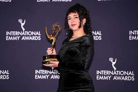 Director Vanessa Bowles, winner in the Current Affairs category for "Dispatches: Kill Zone: Inside Gaza," appears in the press room during the 53rd International Emmy Awards at the New York Hilton Midtown in New York. 