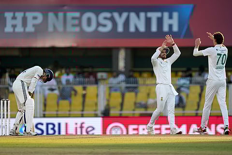 South Africa's Marco Jansen, right, celebrates with teammates after the dismissal of India's Yashasvi Jaiswal, left, on the fourth day of the second cricket test match between India and South Africa in Guwahati.
